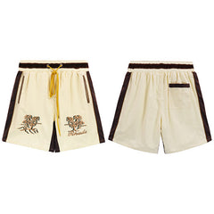 Rhude Cream Embroidered Nylon Shorts